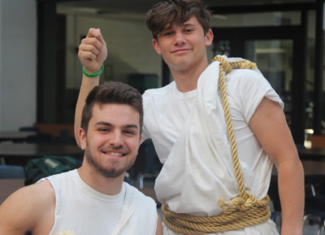 Juniors Alec White, left, and Simon Doyle, right, wear togas on toga day.