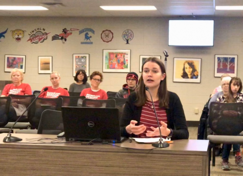 Wauwatosa East Junior Sarah Gifford presents her slideshow at the school board meeting.