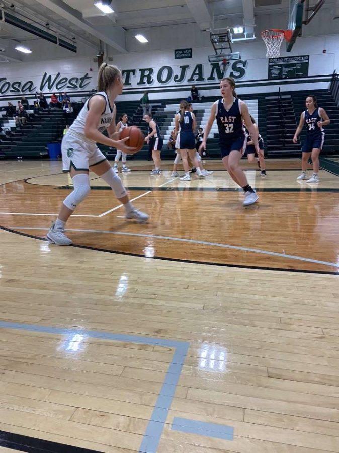Wauwatosa+Wests+Katie+McCabe+%2825%29+is+defended+by+Brookfield+Easts+Maddy+McGath+%2832%29+on+the+perimeter+during+a+regular+season+game+earlier+this+year.+