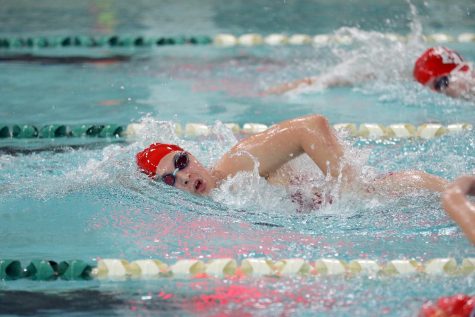Wauwatosa East Freshman Olivia Small swims in a meet against DSHA on September 10.