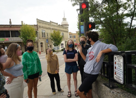 Wauwatosa East Sophomore Henry Dizard preps a group of fellow youth activists before spending the day in the community rallying for racial and climate justice and supporting local candidates.