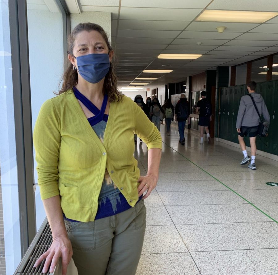 Wauwatosa West math teacher Jill Schmid stands in the hallway near her classroom. Schmid is retiring at the end of the 2020-2021 school year after teaching for 32 years.