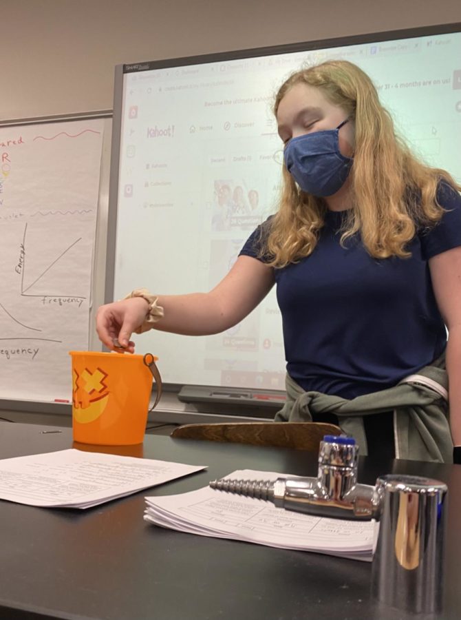 Tosa West Sophomore Sofia Farwell donates during her third hour chemistry class