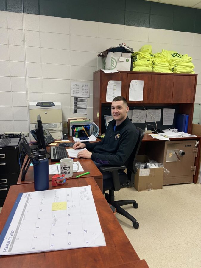 New athletic assistant, Keegan Schrems, sits at his desk in his office. Schrems comes to West after Kari Churchs departure in December of 2021. 