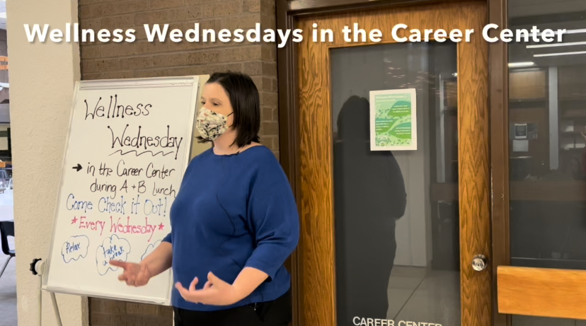 School Social Worker, Amy Nelson, stands infront of the career center. Every week on Wednesday she transforms the career center into a space for a mid-day mental health break. 