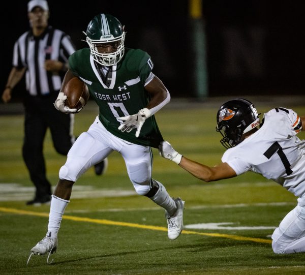 Navigation to Story: Battle for Tosa: Tosa West vs Tosa East Varsity Football